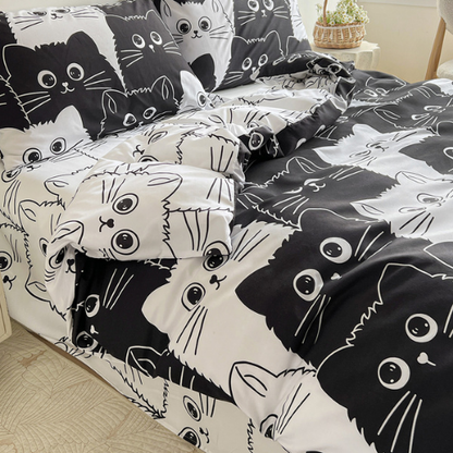 Single 4-piece reversible duvet cover set featuring an adorable black and white cat design.