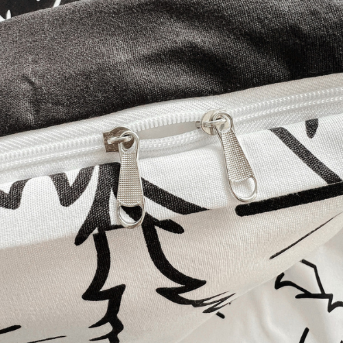 Single 4-piece reversible duvet cover set featuring an adorable black and white cat design.