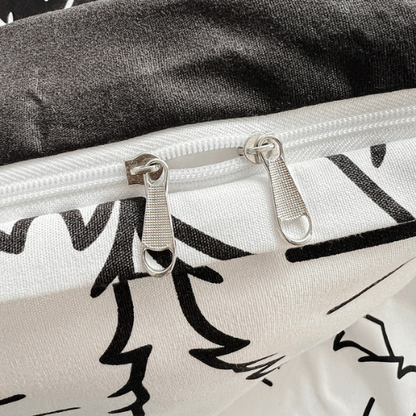 Single 4-piece reversible duvet cover set featuring an adorable black and white cat design.