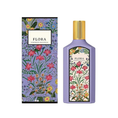 Flora Cologne & Macchialette perfume bottle and its matching box, featuring a lavender purple body, a gold cap, and a colorful floral label with pink flowers and green leaves.