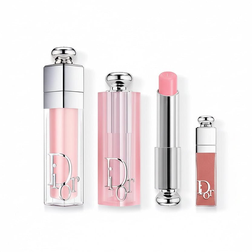 Set of Dior lip products on a white background