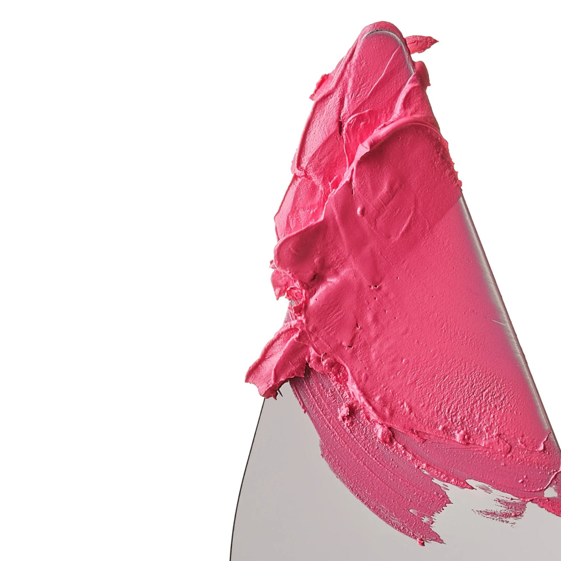 Close-up of pink makeup on a white background