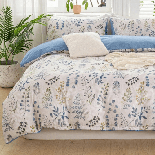 King size 6 piece bedding set, featuring a beautiful blue leaf design.