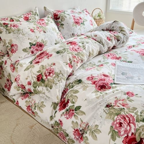 Queen size 6-piece duvet cover set rose print with green leaves.
