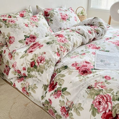 Queen size 6-piece duvet cover set rose print with green leaves.