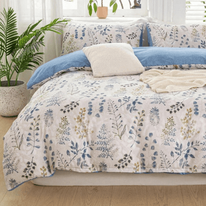 Queen size 6 piece bedding set, featuring a beautiful blue leaf design.