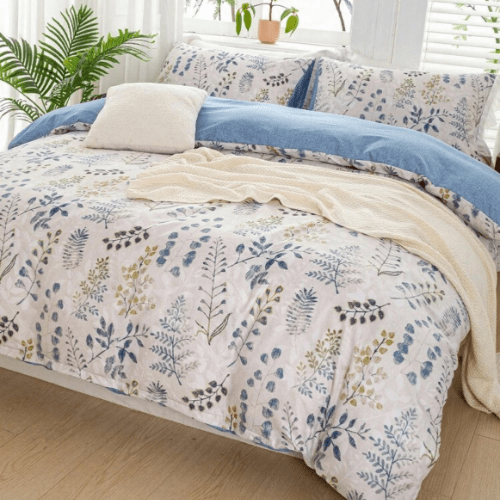 Queen size 6 piece bedding set, featuring a beautiful blue leaf design.