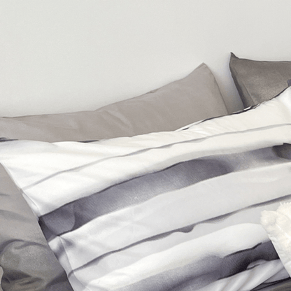 Queen size, 6-piece, reversible duvet cover set featuring a striped design in a vibrant gray color