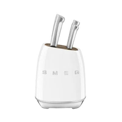 White knife block with three knives on a white background, featuring the SMEG logo.